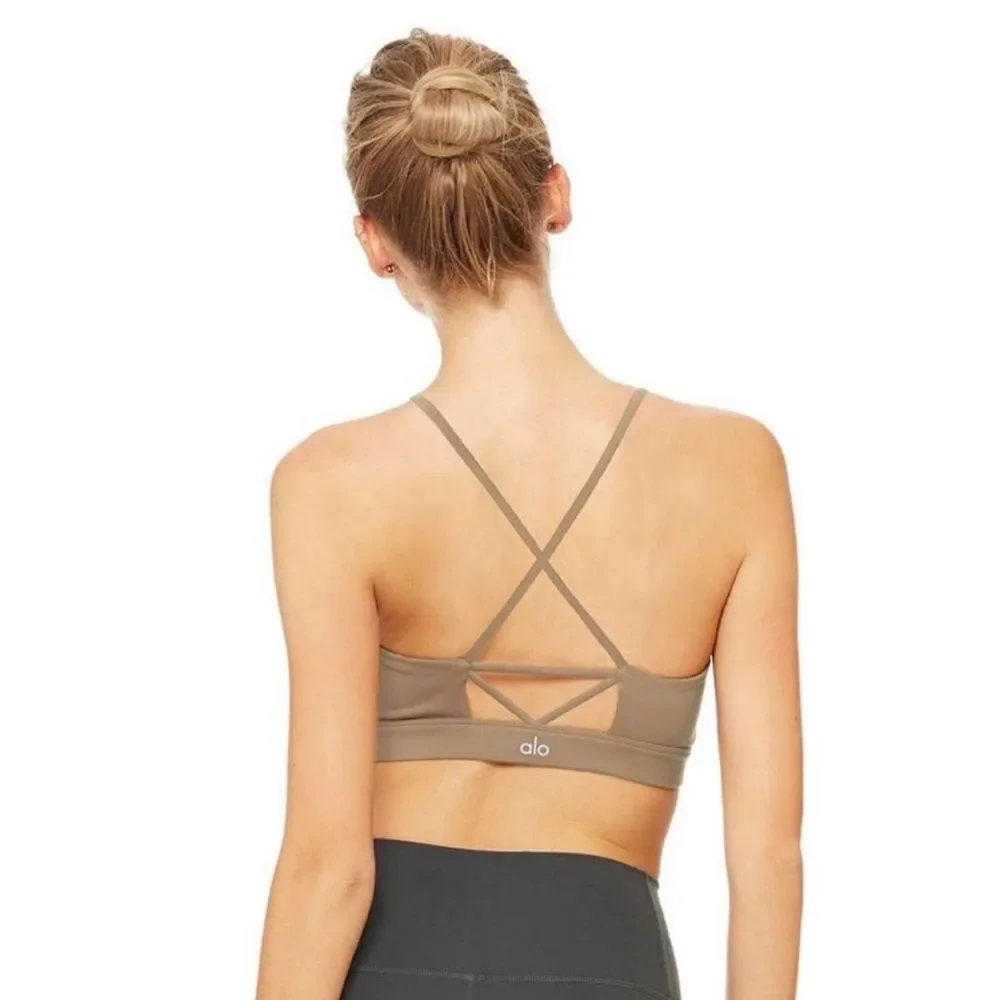 Alo Yoga Starlet Lace Up High Neck Sports Bra in Smoky Quartz tan color Size XS